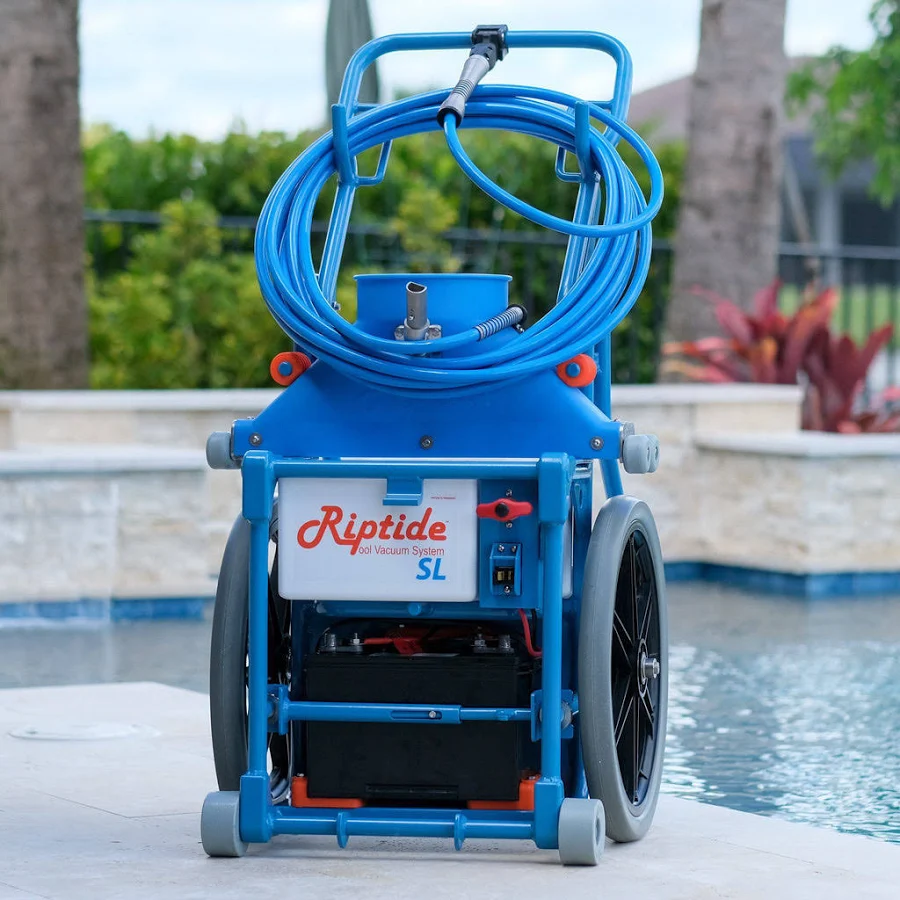 Riptide pool vacuum system by the poolside